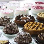 Many cakes on the table. Industrial Cake Line Many cakes on the table. Industrial Cake Line